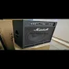 Marshall BA400 professional bass amplifier with graphic EQ, XLR DI output, effects loop, tuner output, switchable horn, and high-power speaker for live performance and studio use.